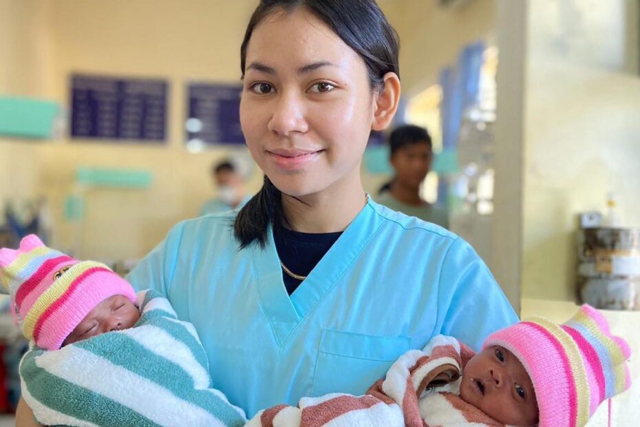 Nurse with premature twins